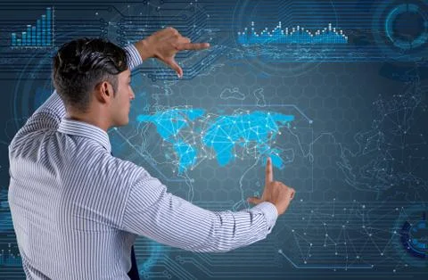 Businessman in futuristic computing concept 库存照片
