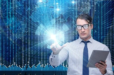Businessman in futuristic computing concept Stock Photos