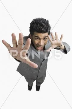 Businessman gesturing and shouting Stock Photos