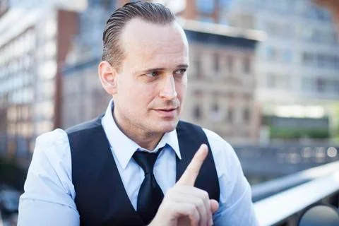 Businessman gesturing with finger Stock Photos