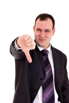 Businessman gesturing thumbs down Foto stock