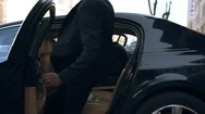 Businessman Gets In The Car Stock Footage