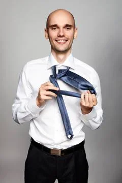 Businessman getting dressed Stock Photos