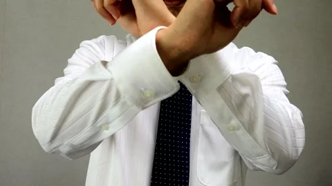 A businessman getting pumped up Stockbeeldmateriaal 335738520