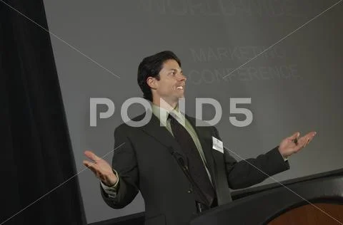 Businessman Giving A Lecture At Conference Stock Photos