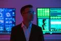 The businessman in glasses on displays background Photo