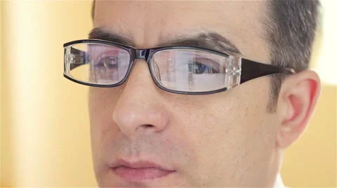 Businessman with glasses working on computer - closeup Stock Footage 61341973