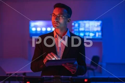 The businessman in glasses working with a tablet Stock Photos