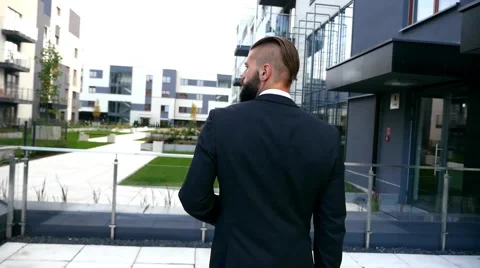 Businessman going to his work. Back view. Stock Footage 60945215