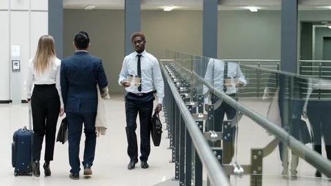 Businessman going inside terminal Stock Footage 100907950