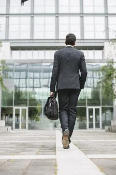 Businessman going to work Stock Photos