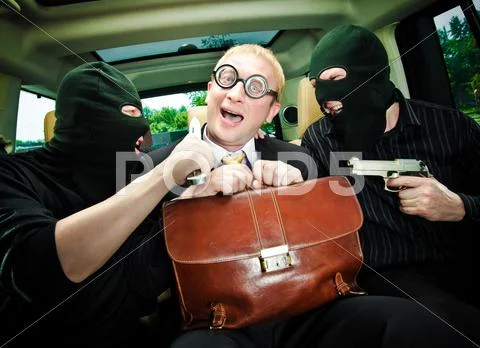 Businessman grasped in hostages. Stock Photos