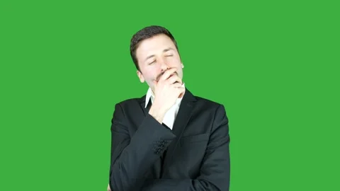 Businessman on green screen thinking Stock Footage 232945313