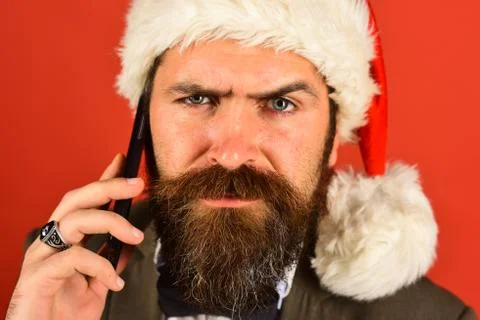 Businessman with grumpy face in close up. Man with beard 스톡 사진