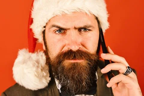 Businessman with grumpy face in close up. Man with beard 스톡 사진