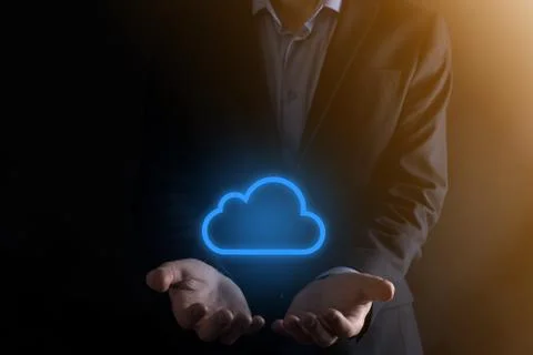 Businessman hand holding cloud computing concept in palm. Backup Storage Data 스톡 사진