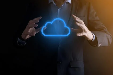 Businessman hand holding cloud computing concept in palm. Backup Storage Data Stock Photos