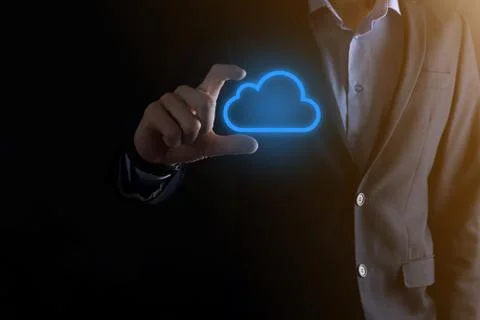 Businessman hand holding cloud computing concept in palm. Backup Storage Data 스톡 사진