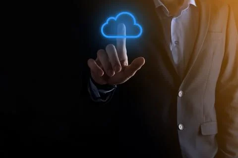 Businessman hand holding cloud computing concept in palm. Backup Storage Data 스톡 사진