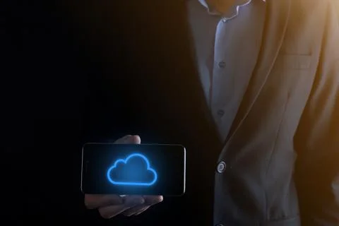 Businessman hand holding cloud computing concept in palm. Backup Storage Data 스톡 사진