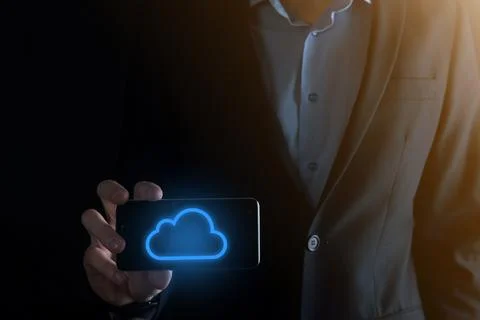 Businessman hand holding cloud computing concept in palm. Backup Storage Data 스톡 사진