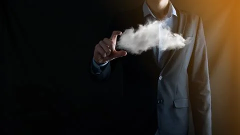 Businessman hand holding cloud.Cloud computing concept, close up of young bus Foto stock