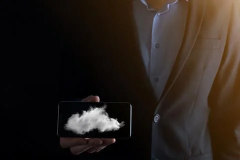 Businessman hand holding cloud.Cloud computing concept, close up of young bus Foto stock