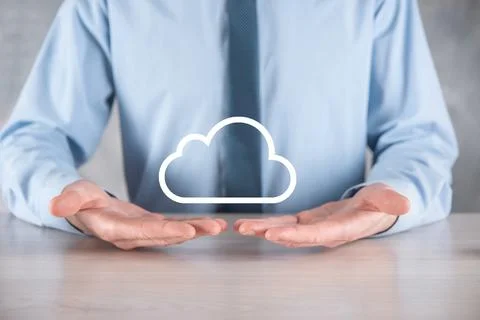 Businessman hand holding cloud.Cloud computing concept, close up of young bus Foto stock