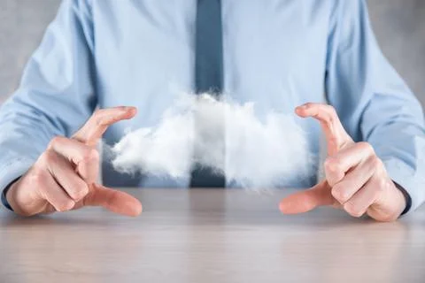 Businessman hand holding cloud.Cloud computing concept, close up of young bus 스톡 사진