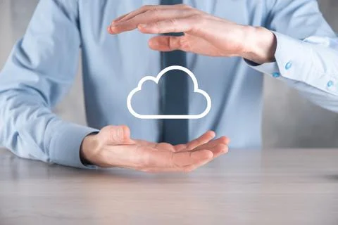 Businessman hand holding cloud.Cloud computing concept, close up of young bus Foto stock