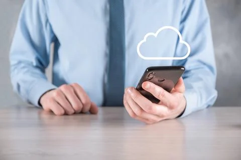 Businessman hand holding cloud.Cloud computing concept, close up of young bus 스톡 사진