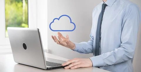 Businessman hand holding cloud.Cloud computing concept, close up of young bus 스톡 사진