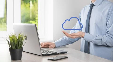 Businessman hand holding cloud.Cloud computing concept, close up of young bus 스톡 사진