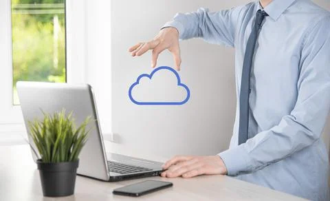 Businessman hand holding cloud.Cloud computing concept, close up of young bus Stock Photos
