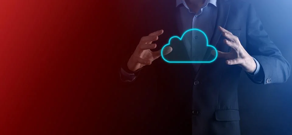 Businessman hand holding cloud.Cloud computing concept, close up of young bus Stock Photos