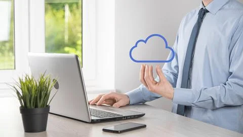 Businessman hand holding cloud.Cloud computing concept, close up of young bus Stock Photos