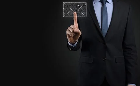 Businessman hand holding e-mail icon, Contact us by newsletter email and prot 写真素材