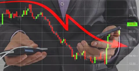 Businessman hand making a decrease chart. Concept of economic downturn. Global 스톡 사진