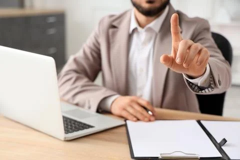 Businessman hand pointing forward, virtual screen interaction, digital interf Stock Photos