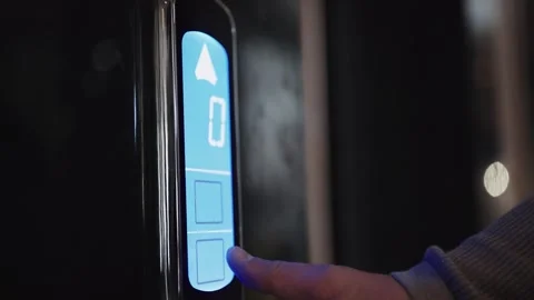 Businessman hand pressing elevator call button down on a touchscreen control  Stock Footage 323393469