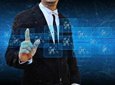 Businessman hand pushing button on a touch screen interface Stock Photos