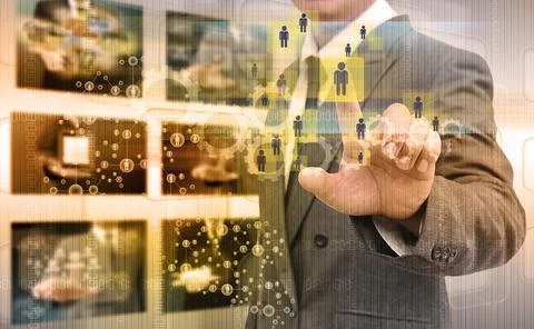 Businessman hand pushing button on a touch screen interface Stock Photos