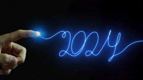 Businessman hand showing virtual continuous line word of new year 2024. Stock Footage 252345844