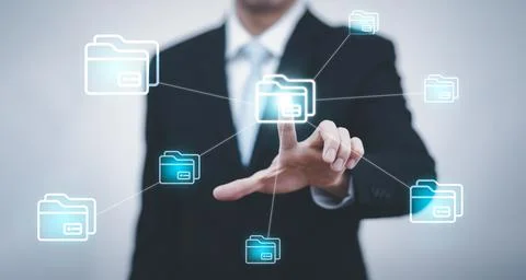 Businessman hand touch folder of document Management System,  online document Stock Photos