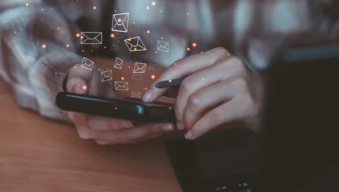Businessman hand using smartphone with email sent out icon communication bu.. Stock Photos