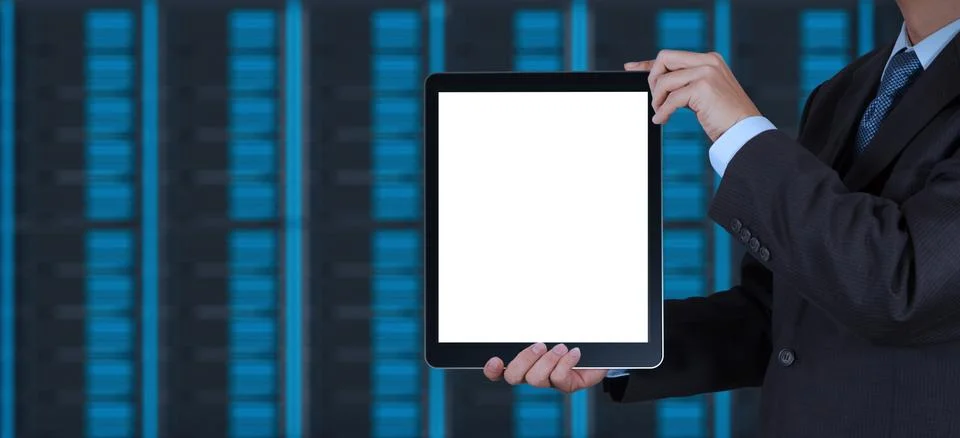 Businessman hand using tablet computer and server room background 스톡 일러스트