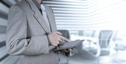 Businessman hand using tablet computer Stock Illustration