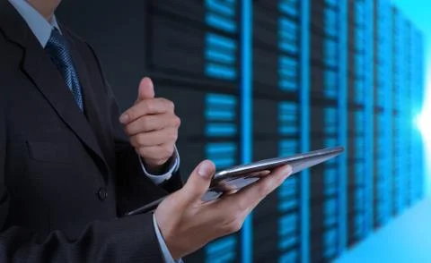 Businessman hand using tablet computer and server room Stockillustratie