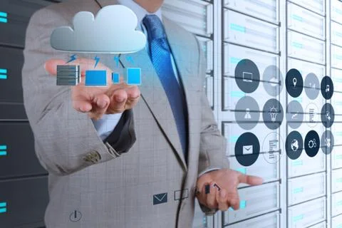 Businessman hand working with a cloud computing diagram on the new computer i Stock Illustration