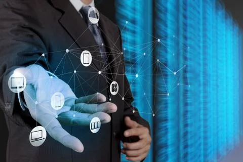 Businessman hand working with a cloud computing diagram on the new computer i Illustrazione stock